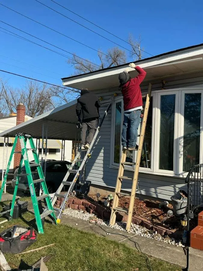 Restoration crew performing exterior repair in Johnston